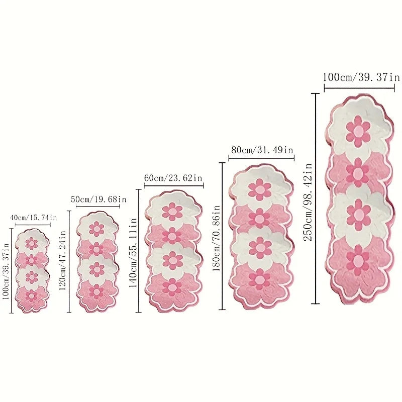 Pink and white scalloped floral plush rug runner size options shown with measurements.