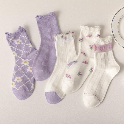 Floral socks set: lavender argyle, lavender solid, and white socks with small flowers