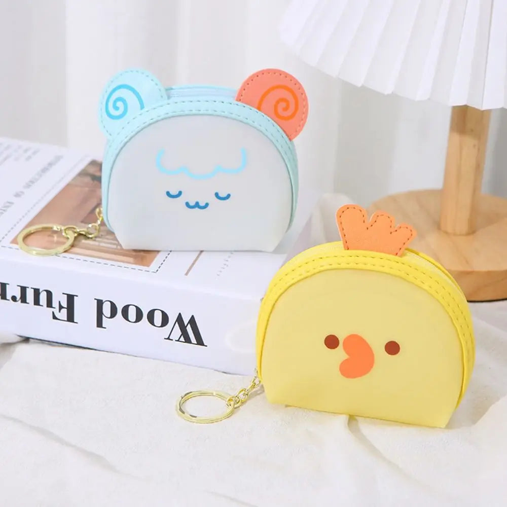Kawaii animal coin purse with light blue cat face and yellow bear face, with key rings