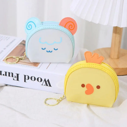 Kawaii animal coin purse with light blue cat face and yellow bear face, with key rings