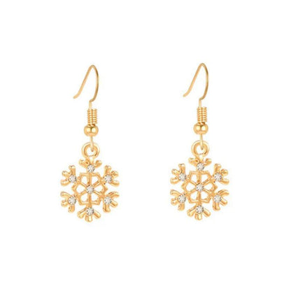 Gold-tone snowflake drop earrings with crystal centers and hanging bead caps