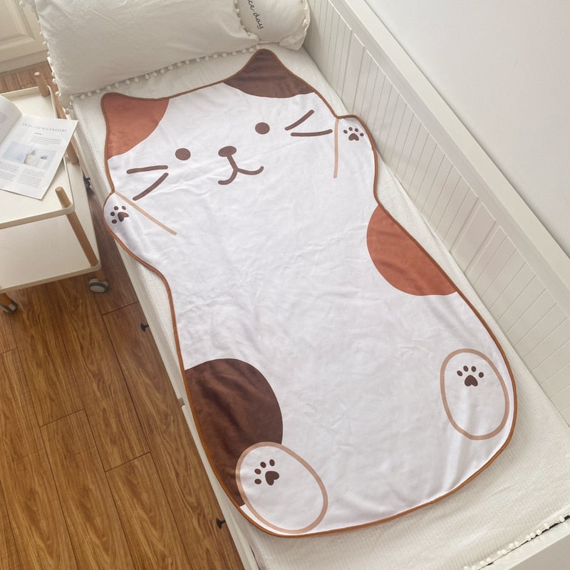 Cat flannel blanket with white base and brown cat face, rounded blanket shape