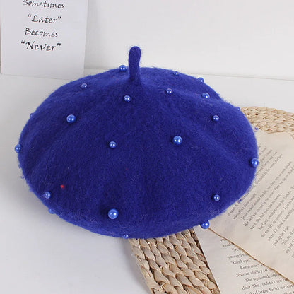 Royal blue felt beret with faux pearl dots and small center crown