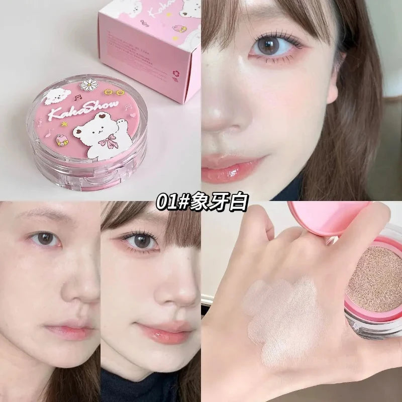 Air cushion foundation compact and beige shade swatches on hand with matching pink lid