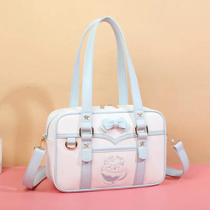 Light blue-and-white kawaii messenger bag with bow front, star accents, and side strap