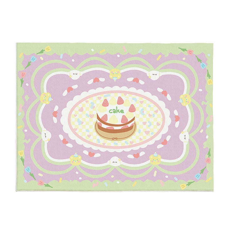 Pastel area rug with central cake illustration, rainbow swirls, and cute animal faces