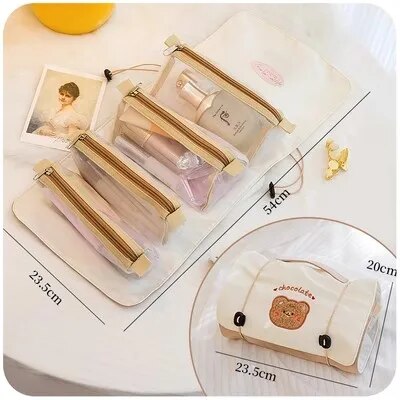 Cream roll-up makeup bag set with long clear zip pouches and size diagram markers