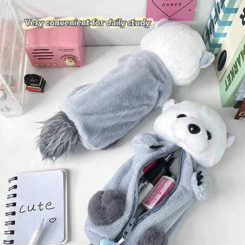 Otter plush pencil case, gray and white, open zipper showing stationery inside