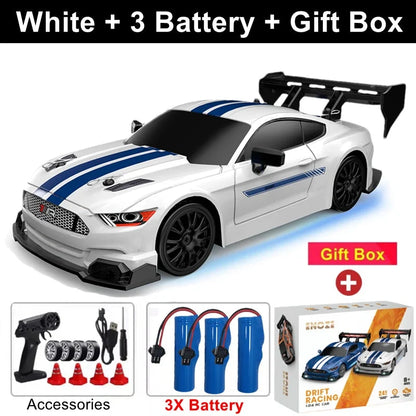 White RC drift racing car with blue stripes and rear wing, 3 batteries, gift box