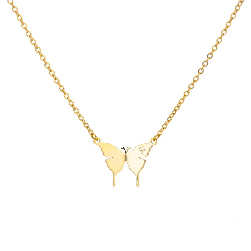 Gold-tone butterfly initial letter necklace with letter F between two butterfly pendants