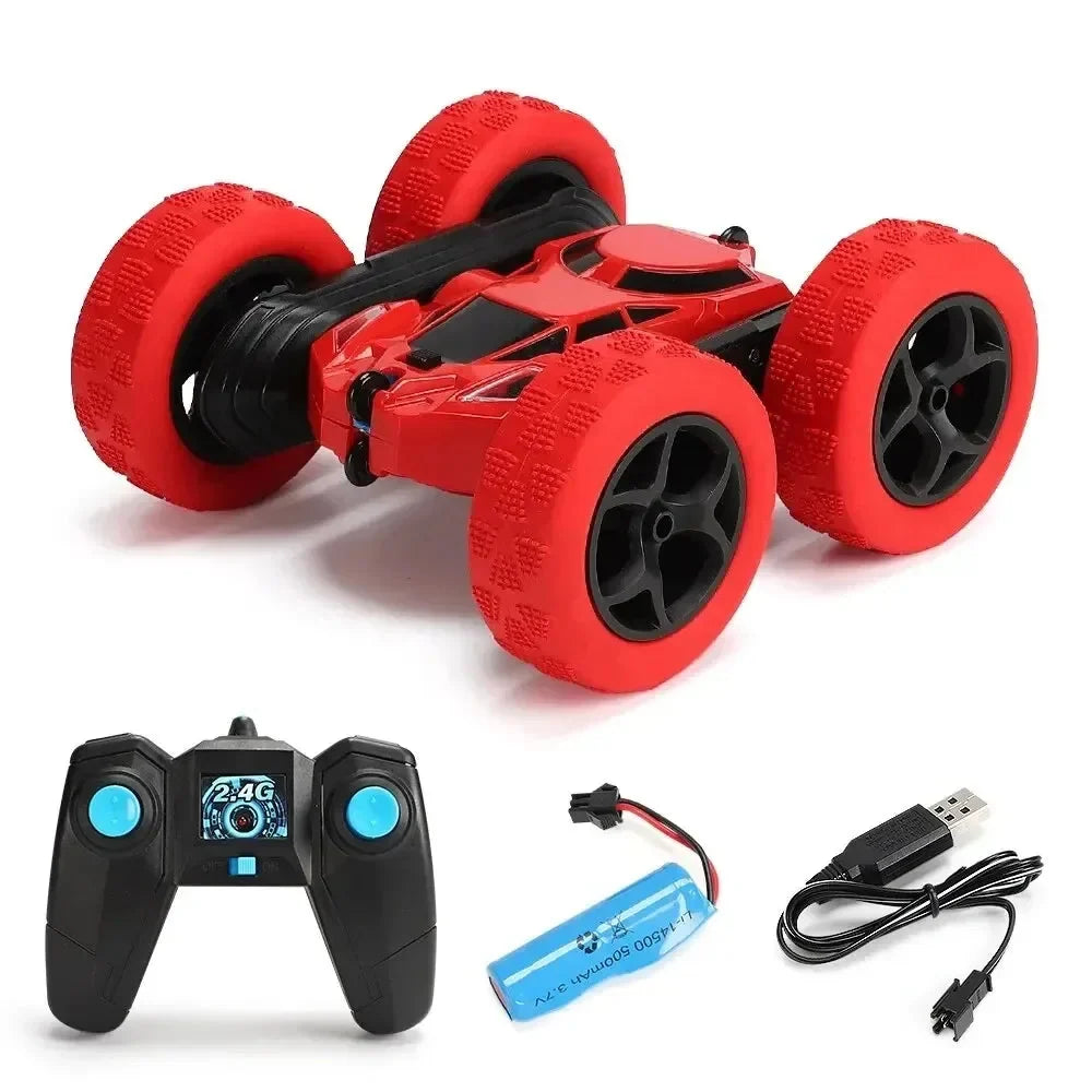 Red RC stunt car with oversized foam tires and 2.4G remote controller