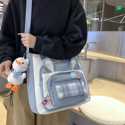 Light blue bunny-ear tote shoulder bag with front plaid pocket and mini zip pouch
