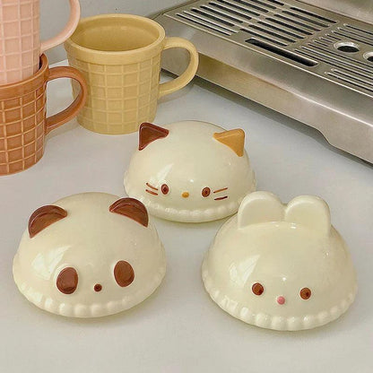 Animal ice cream mug set with cat, panda, and bunny faces in cream and yellow colors
