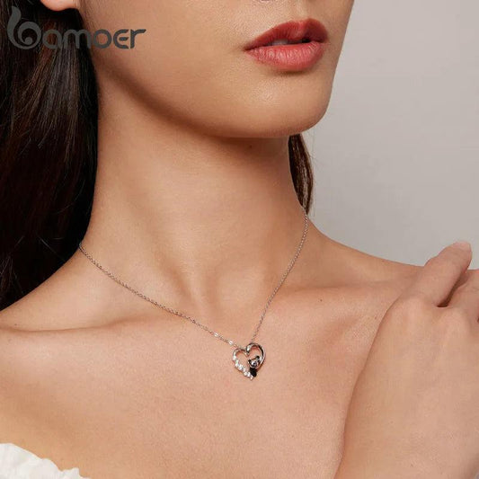Sterling silver heart panda necklace with crystal-studded charm on fine chain