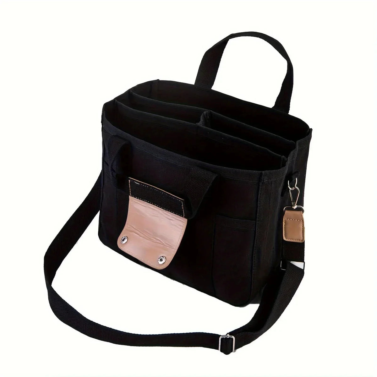 Black canvas crossbody tote with front snap pocket, key clip, and adjustable strap