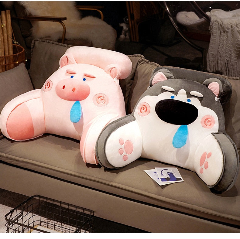 Pink and gray animal reading pillows, each with cartoon faces and curled cheek details