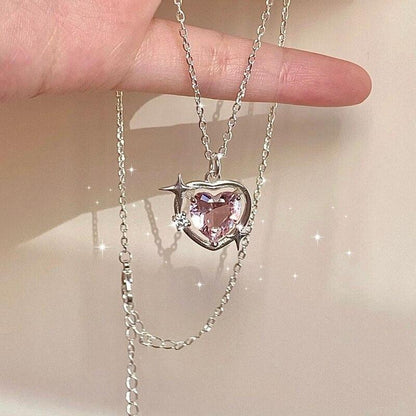 Heart crystal pendant necklace with silver-tone chain and pink faceted heart