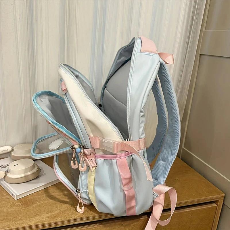 Pastel backpack with multiple front compartments and long adjustable straps