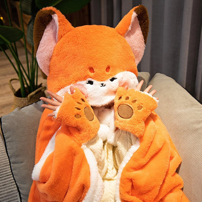 Orange fox blanket hoodie with plush fox-face hood and matching paw-like accents