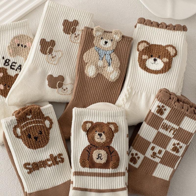 Teddy bear crew socks set with white, tan, and brown panels, bear and heart knit motifs