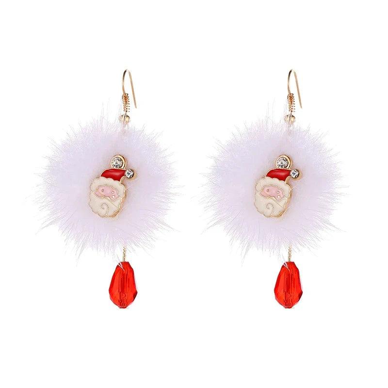 Gold-tone holiday bear face drop earrings with white feather puff and red crystal drop