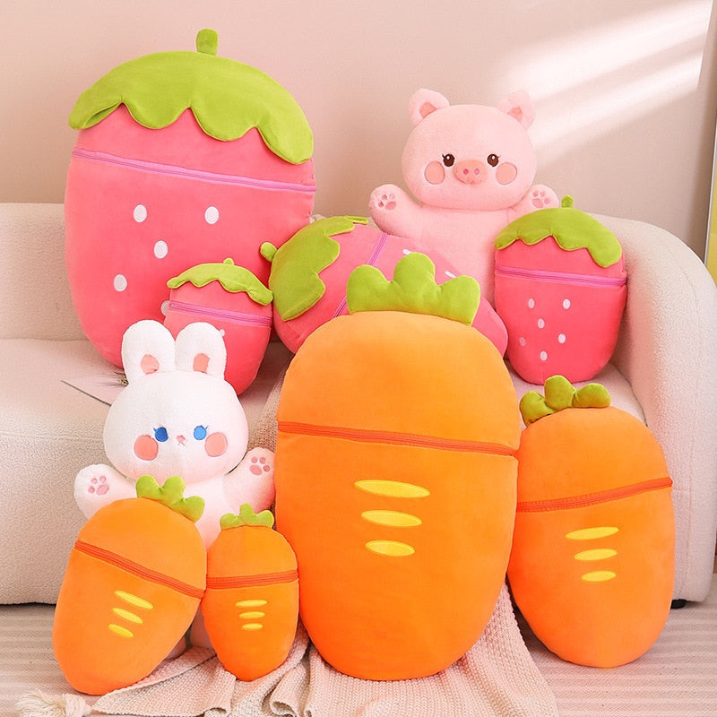 Assorted fruit-themed animal plushies with bunny and pig faces in strawberry and carrot shapes