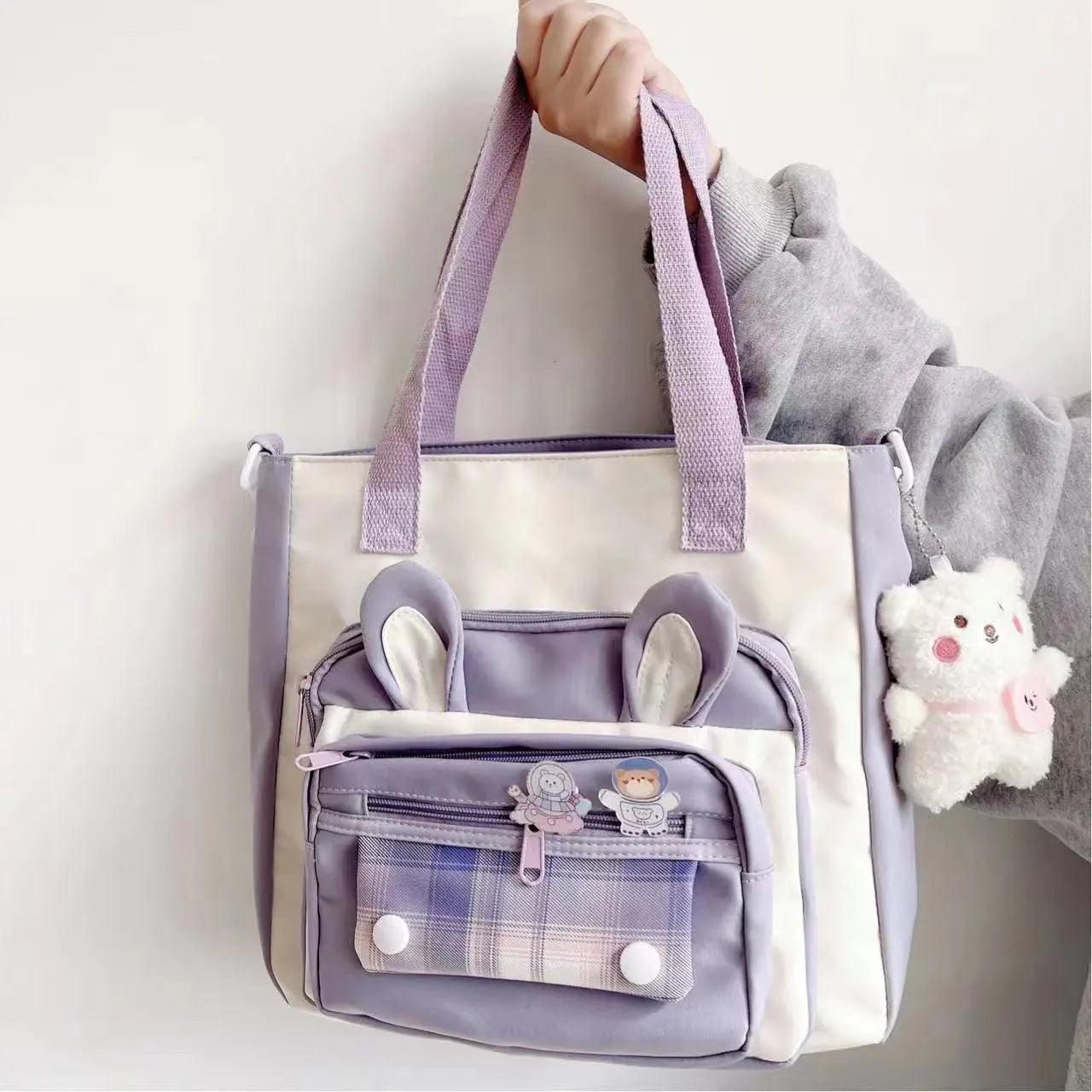 Purple bunny-ear tote shoulder bag with front plaid pocket and dangling plush charm