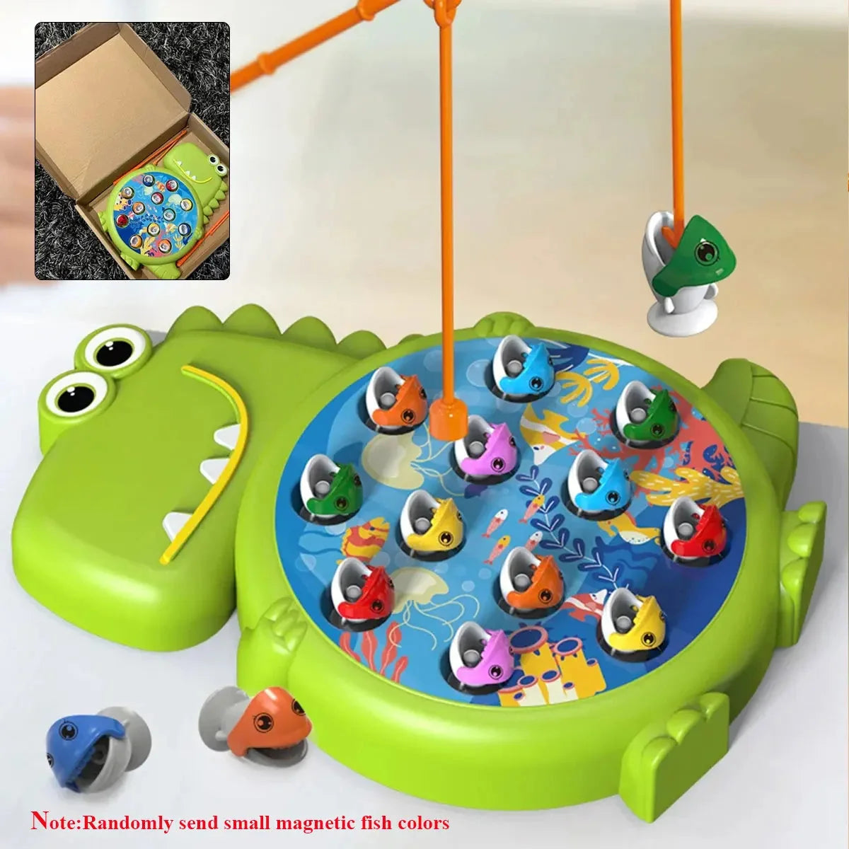 Green dinosaur magnetic fishing toy with circular play mat and orange fishing rods