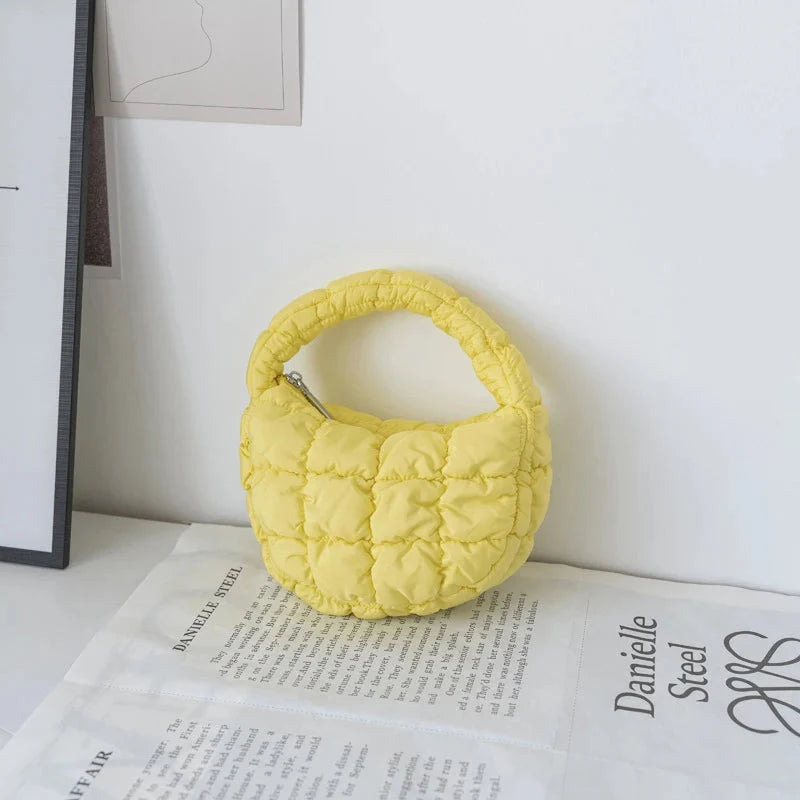 Mini quilted puffer circle tote bag with short handles, pale yellow