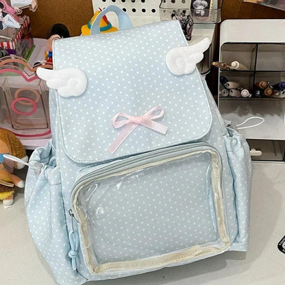 Light blue polka dot backpack with bow, plush cloud handle, and transparent front pocket