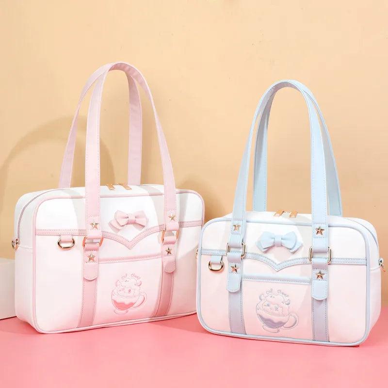 Pink-and-white kawaii messenger bag with bow front, star accents, and double handles