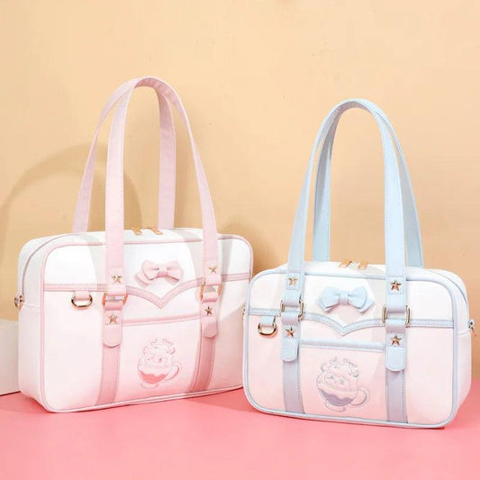 Pink-and-white kawaii messenger bag with bow front, star accents, and double handles