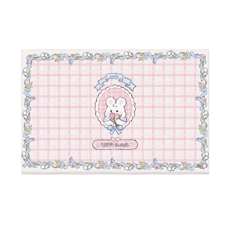 Pastel plush area rug with teddy bear outline art and blue chain border on pink grid background
