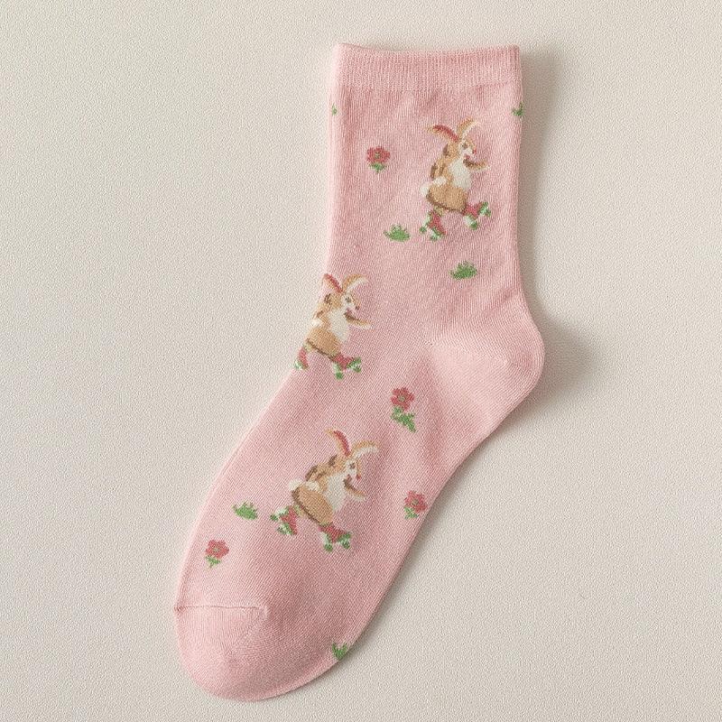 Pink socks with small animal and flower print