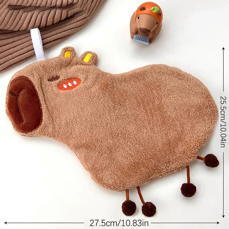 Capybara cotton hand towel with hanging loop, long plush shape with embroidered eye and fruit