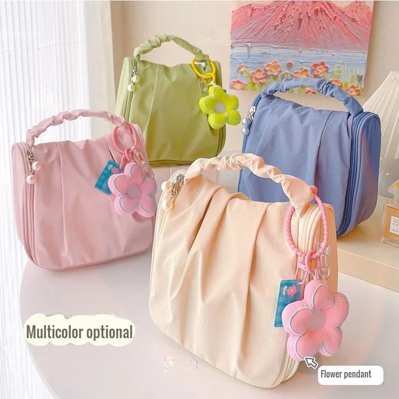 Hanging makeup bag with flower pendant charm and mesh pockets, multicolor set