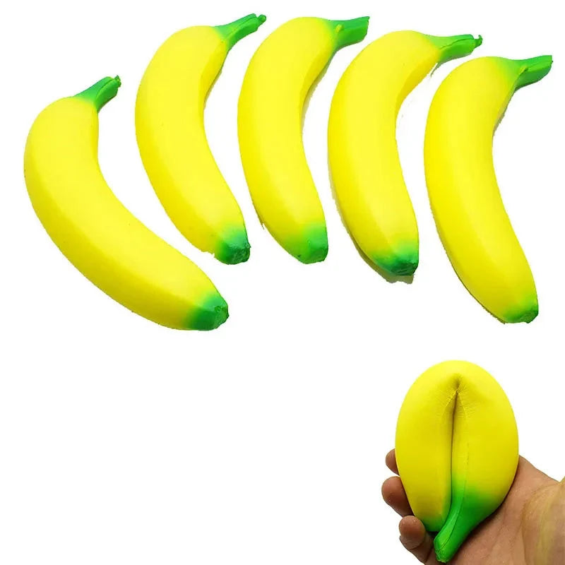 Jumbo squishy banana toy, yellow fruit shape with green tip, multiple angles