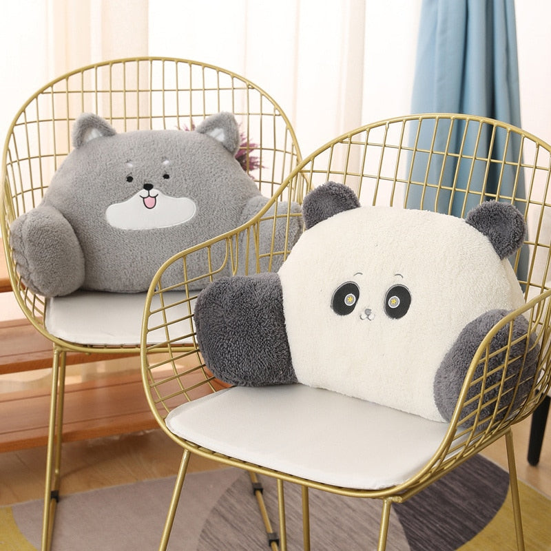 Plush animal cushions on chairs: gray bear and white panda