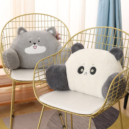 Plush animal cushions on chairs: gray bear and white panda