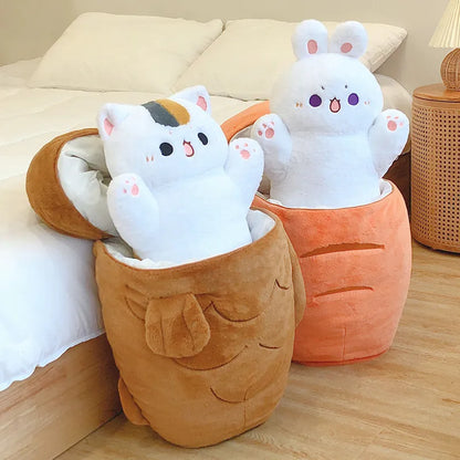 Cat-themed animal plush in brown costume pouch with white face and pink paw details