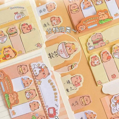 Capybara bookmark sticky notes, small character designs with pastel note tabs laid out