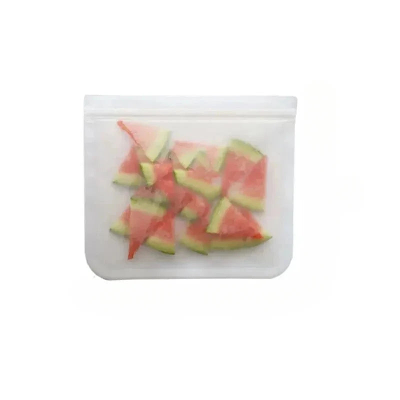 Reusable silicone food storage bag with clear zip top, filled with watermelon chunks