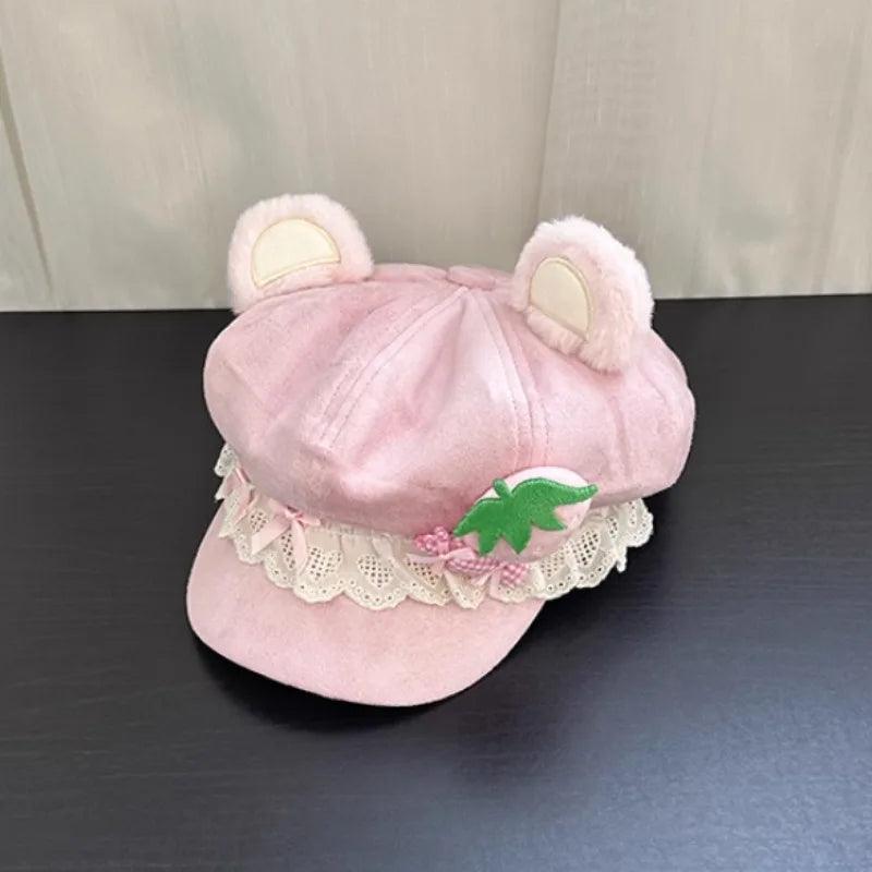 Pink bear cap, lace ruffle hem and green strawberry applique, back view