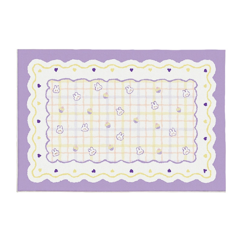 Purple plush area rug with scalloped border, light checker grid, and small bunny faces