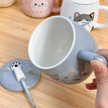 Grey cat ceramic mug with matching lid and spoon rest on top