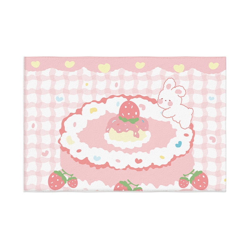 Pastel plush area rug with white hearts border and bunny beside a pink dessert in blush and green