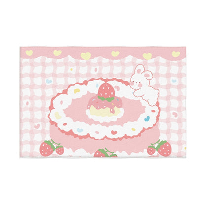Pastel plush area rug with white hearts border and bunny beside a pink dessert in blush and green