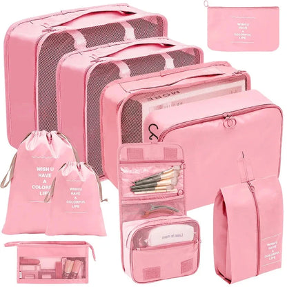 Pink packing cube set with gray mesh panels and zip pouches for organized travel