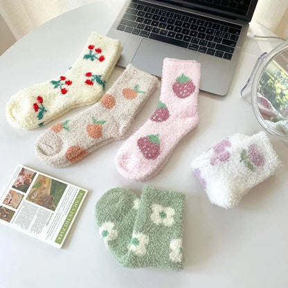 Soft plush sleeping socks with strawberry and carrot patterns, cream and pink tones