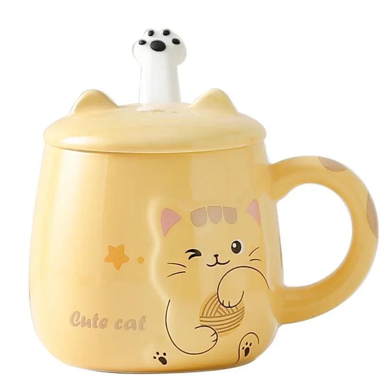 Yellow cat ceramic mug with paw-print lid and side handle